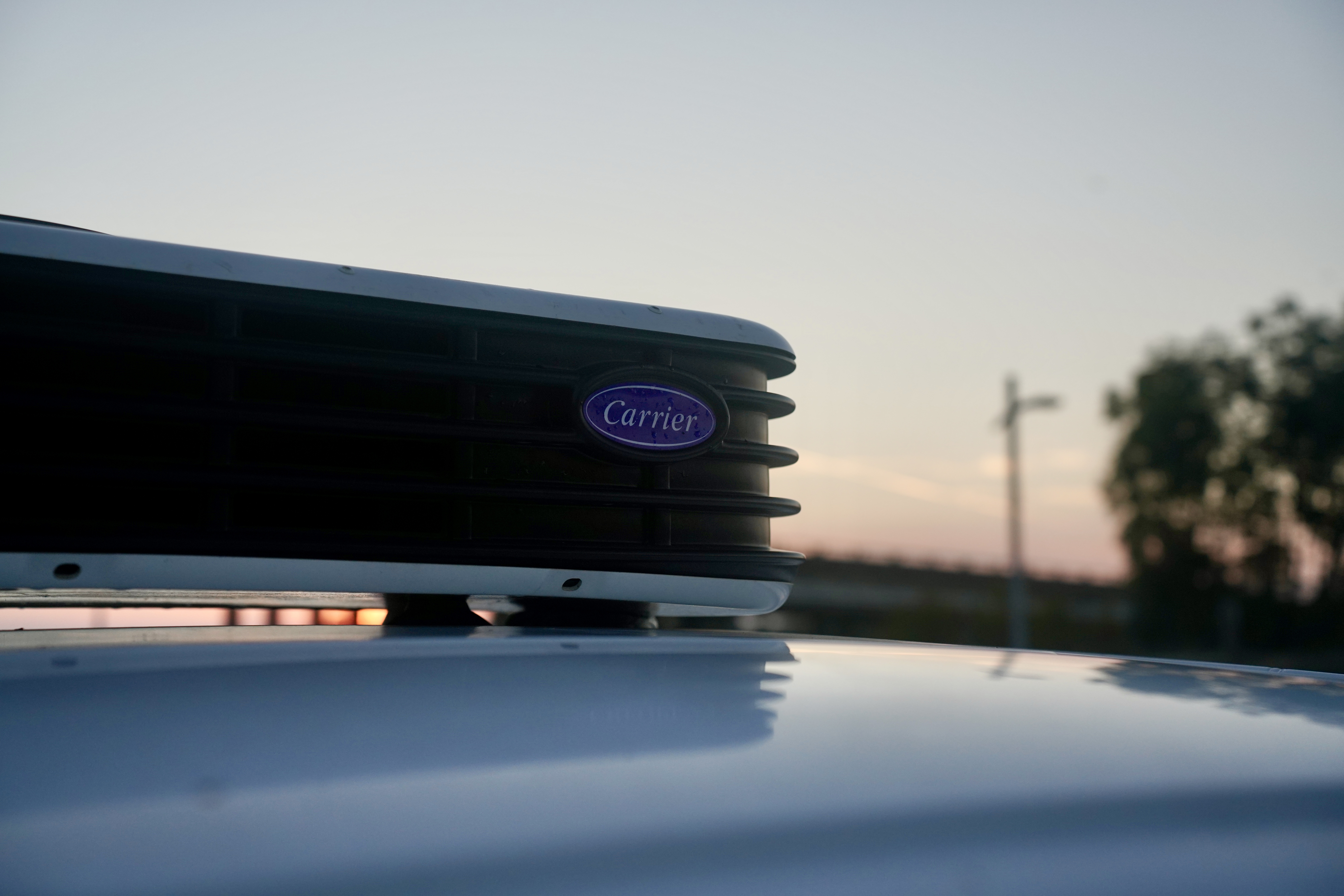 Mechanic servicing a van to ensure maintenance schedule compliance.